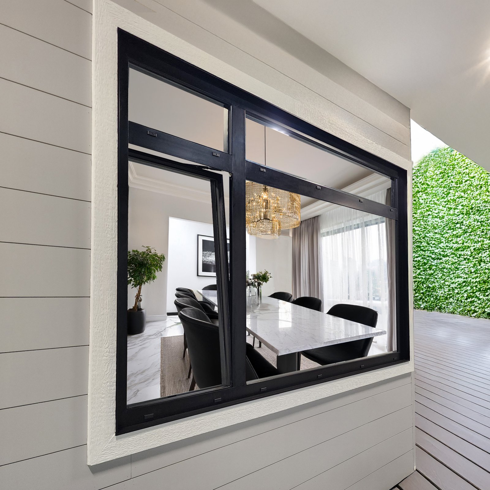 ENNION aluminum tilt and turn window with transoms above, tilted open on a dining room